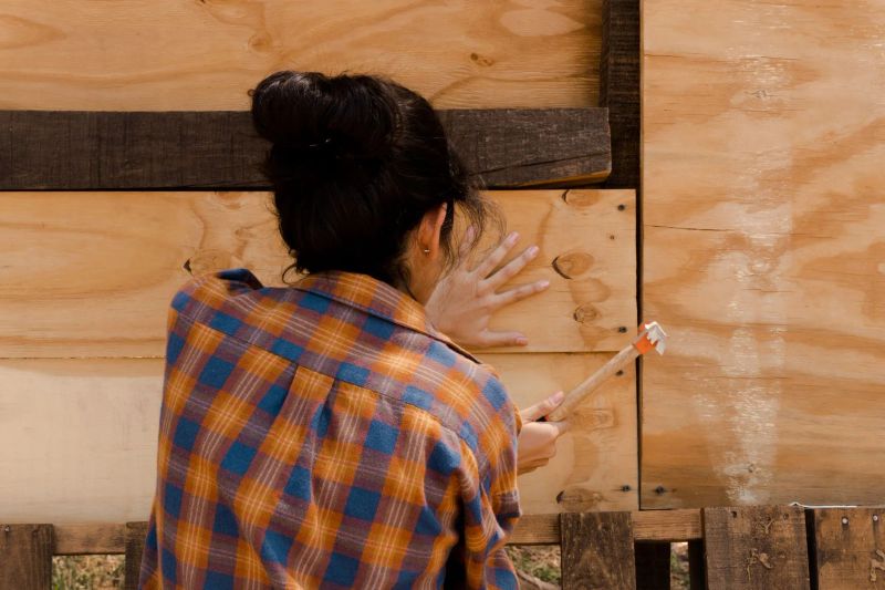 Handyman assembling furniture neatly inside a Calcot home